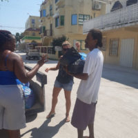 Hand of Love Food Drive Caye Caulker